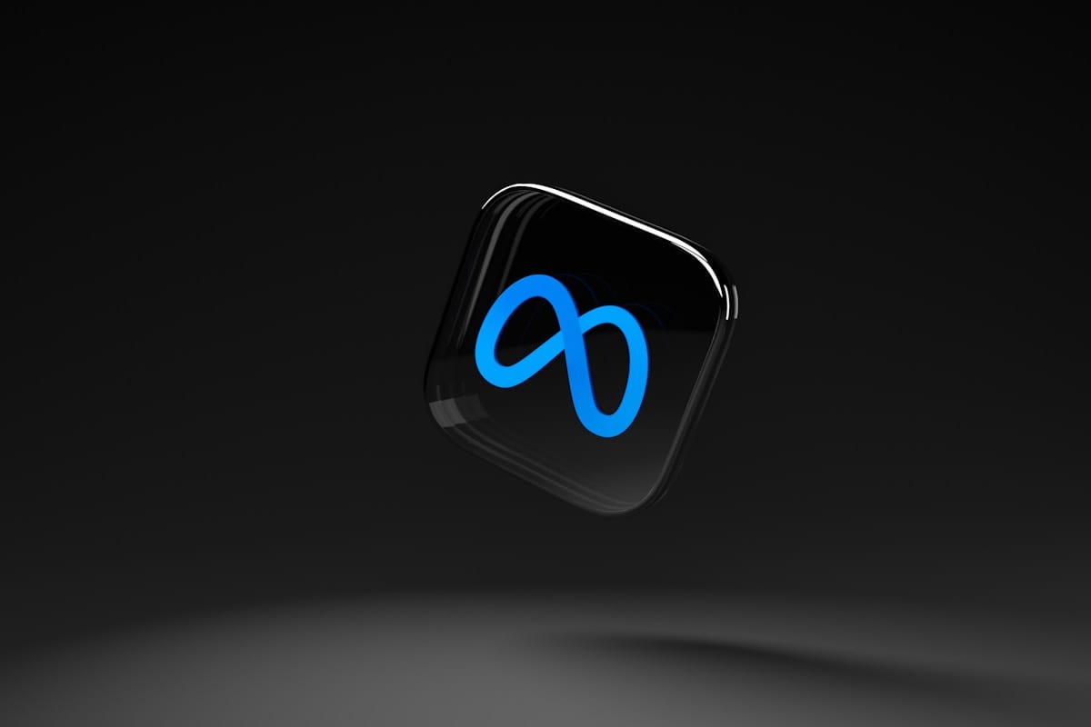Meta a black square with a blue logo on it